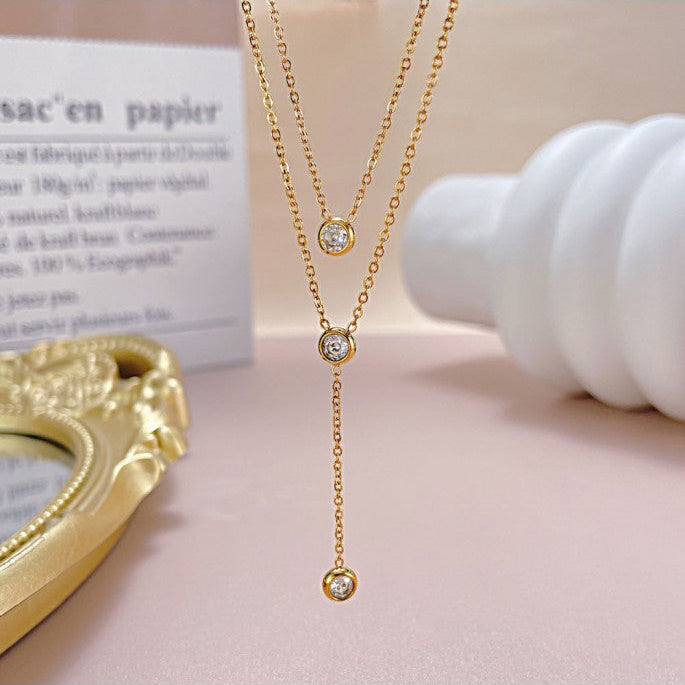 Collier original et délicat avec double chaîne plaquée or - CL174